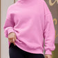 Soft pink oversized mock neck dropped shoulder sweatshirt with ribbed cuffs