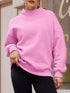 Soft pink oversized mock neck dropped shoulder sweatshirt with ribbed cuffs