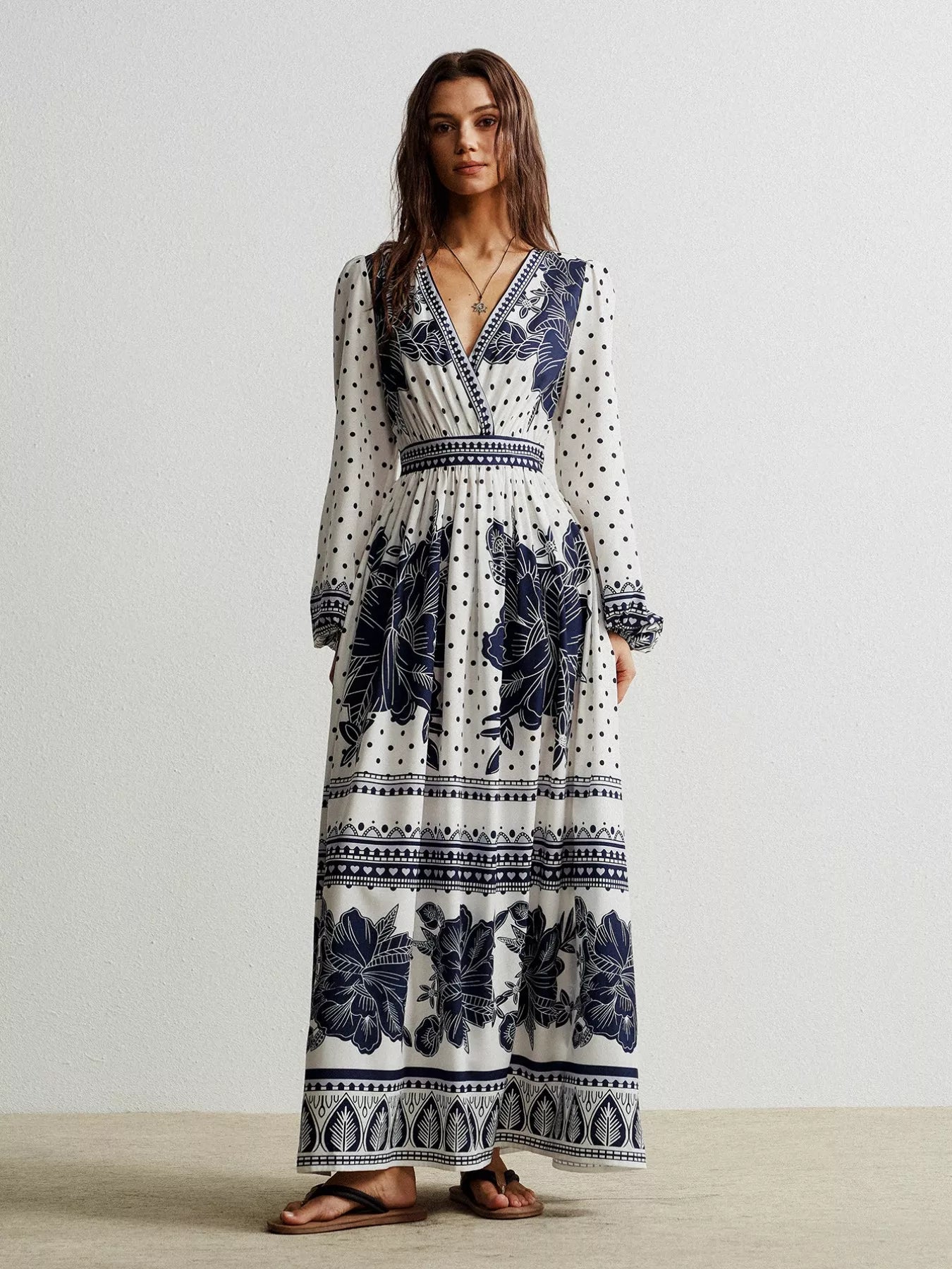 Floral print long sleeve maxi dress in white with navy patterns