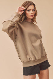 Aemi + Co Exposed Seam Round Neck Drop Shoulder Sweatshirt | Sweatshirts Daverri Fashions