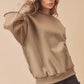 Aemi + Co Exposed Seam Round Neck Drop Shoulder Sweatshirt - DAVERRI FASHIONS