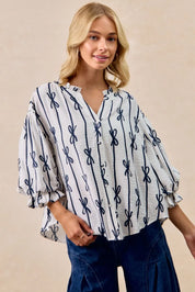 BiBi Bow Ribbon Printed Woven Bubble Sleeves Top | Shirts Daverri Fashions