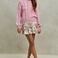 Soft pink cable-knit sweater with ribbed hem and cuffs on SO ME Floral Print Skirt