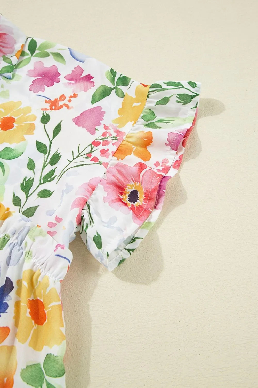 Floral boxy fit ruffled short sleeve blouse in watercolor pink floral pattern