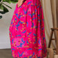Vibrant pink Davi & Dani printed smocking waistband ruffled maxi skirt with floral pattern