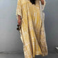 Flowing yellow and cream tie-dye V-neck maxi kaftan dress with wide sleeves