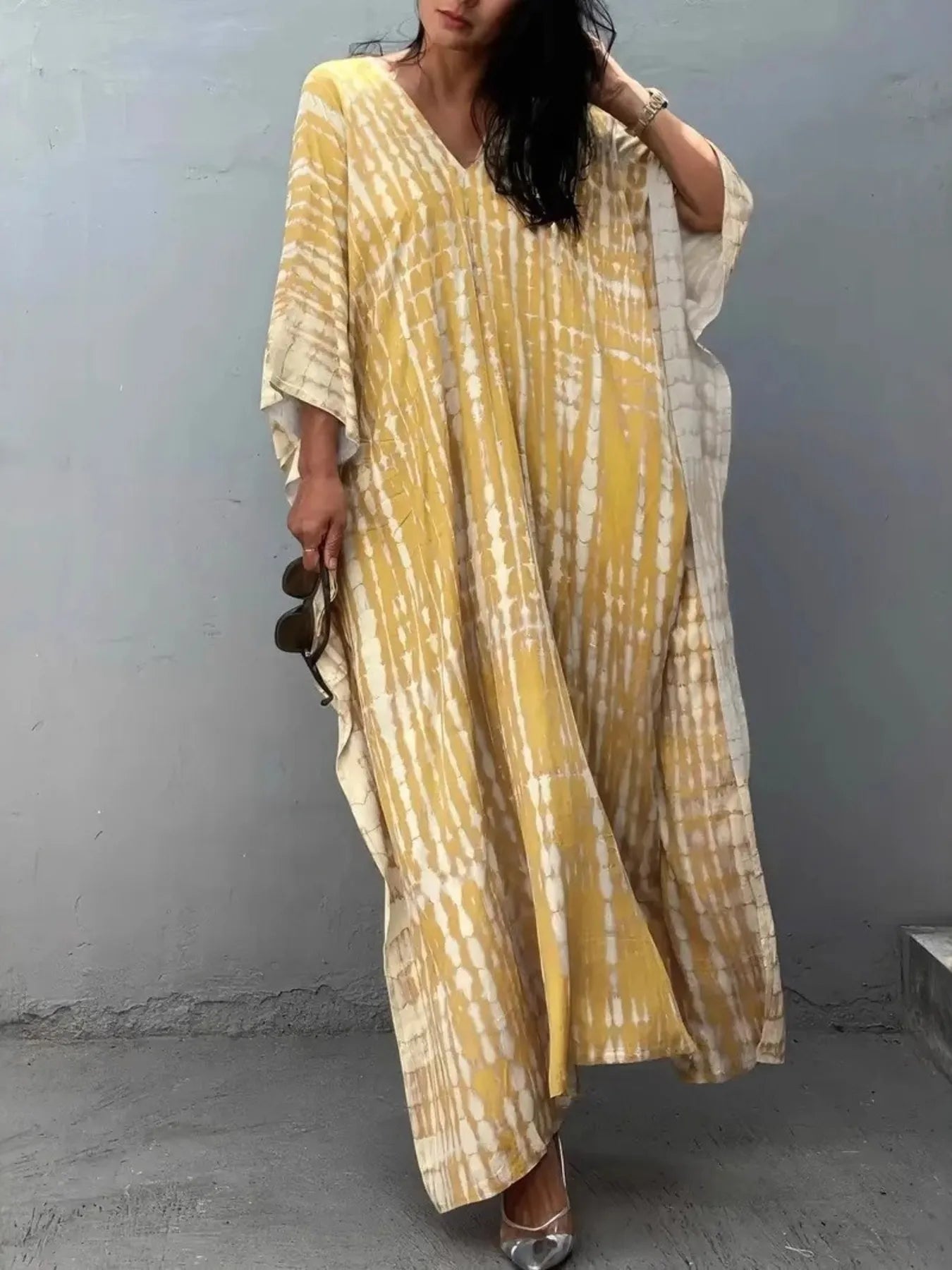 Flowing yellow and cream tie-dye V-neck maxi kaftan dress with wide sleeves