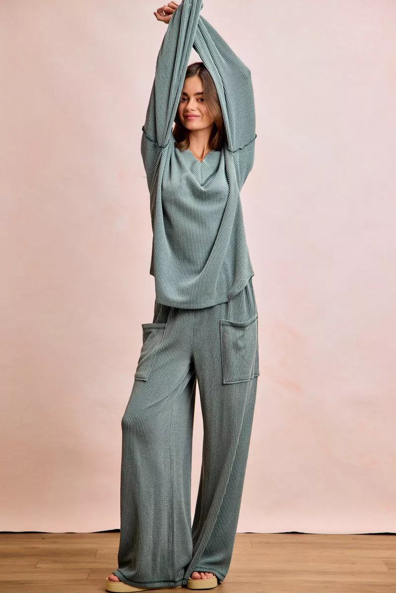 Cozy sage green ribbed loungewear set with cowl-neck top and wide-leg pants