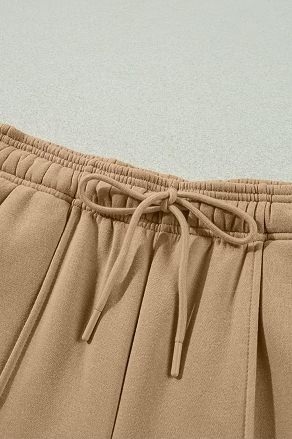 Daverri wide leg drawstring pants in beige with textured fabric and elastic waistband