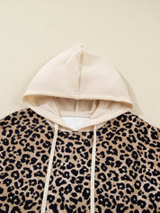 Leopard print long sleeve hoodie with cream hood, drawstrings and pocket