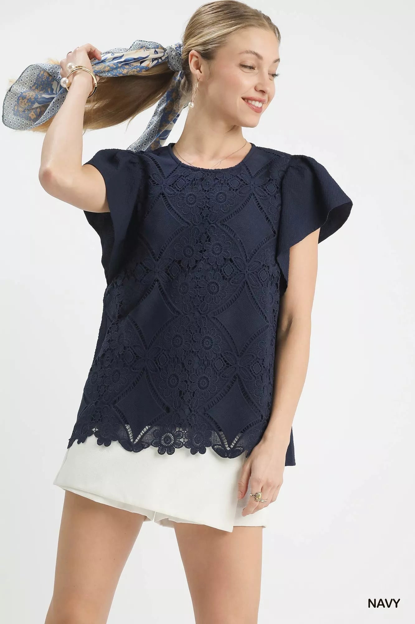 Navy blue Umgee floral lace overlay top with puff sleeves and scalloped hem