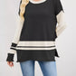 Black and cream color-blocked Color Block Side Slit Sweater with ribbed texture