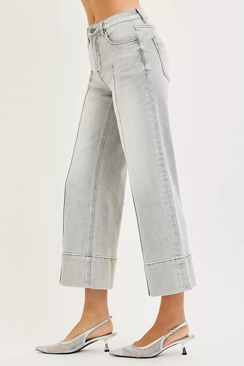 Risen tummy control mid-rise crop wide-leg jeans in light-wash denim with pintuck front