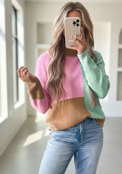 Pastel colorblock mock neck sweater with long sleeves and ribbed trim