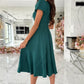 Teal surplice short sleeve midi dress with flutter sleeves