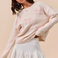 SO ME cream knit sweater with pink bow embroidery