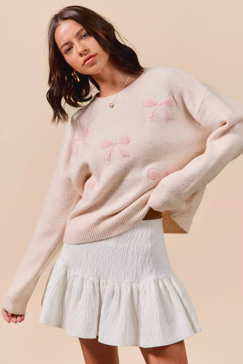 SO ME cream knit sweater with pink bow embroidery