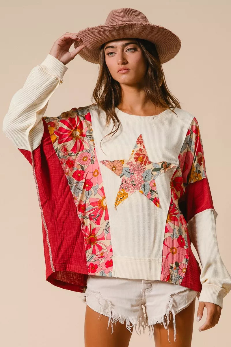 BiBi Floral Print Mixed Star Patch Round Neck Sweatshirt with red accents