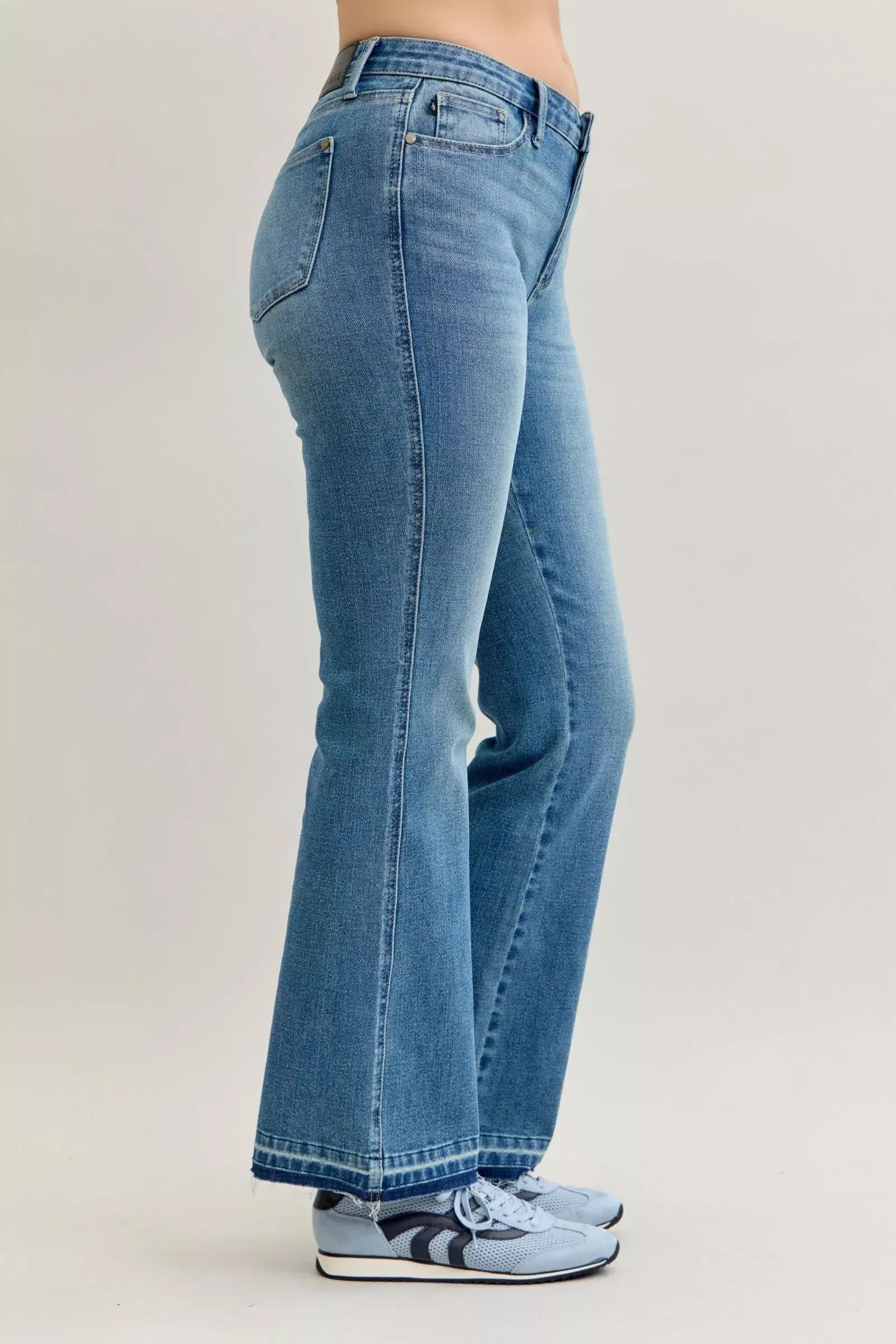 Judy Blue Full Size Mid Rise Slim Bootcut Tummy Control Release Hem Jeans Plus Size - DAVERRI FASHIONS