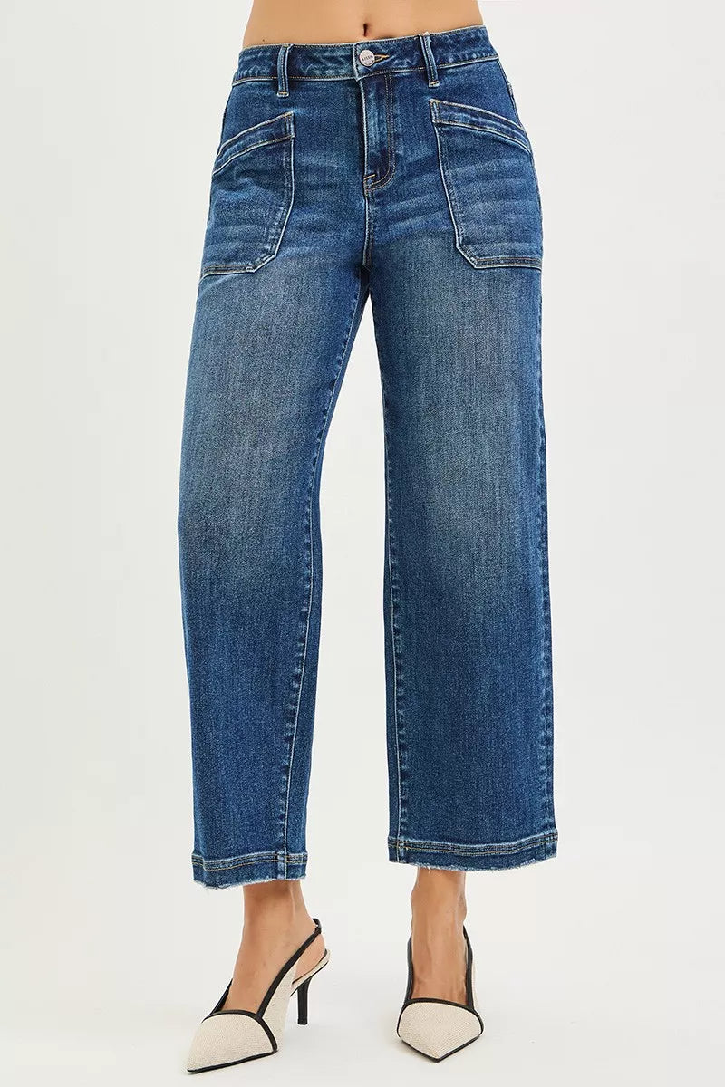 RISEN slouchy cropped baggy jeans in mid-wash blue denim with frayed hems