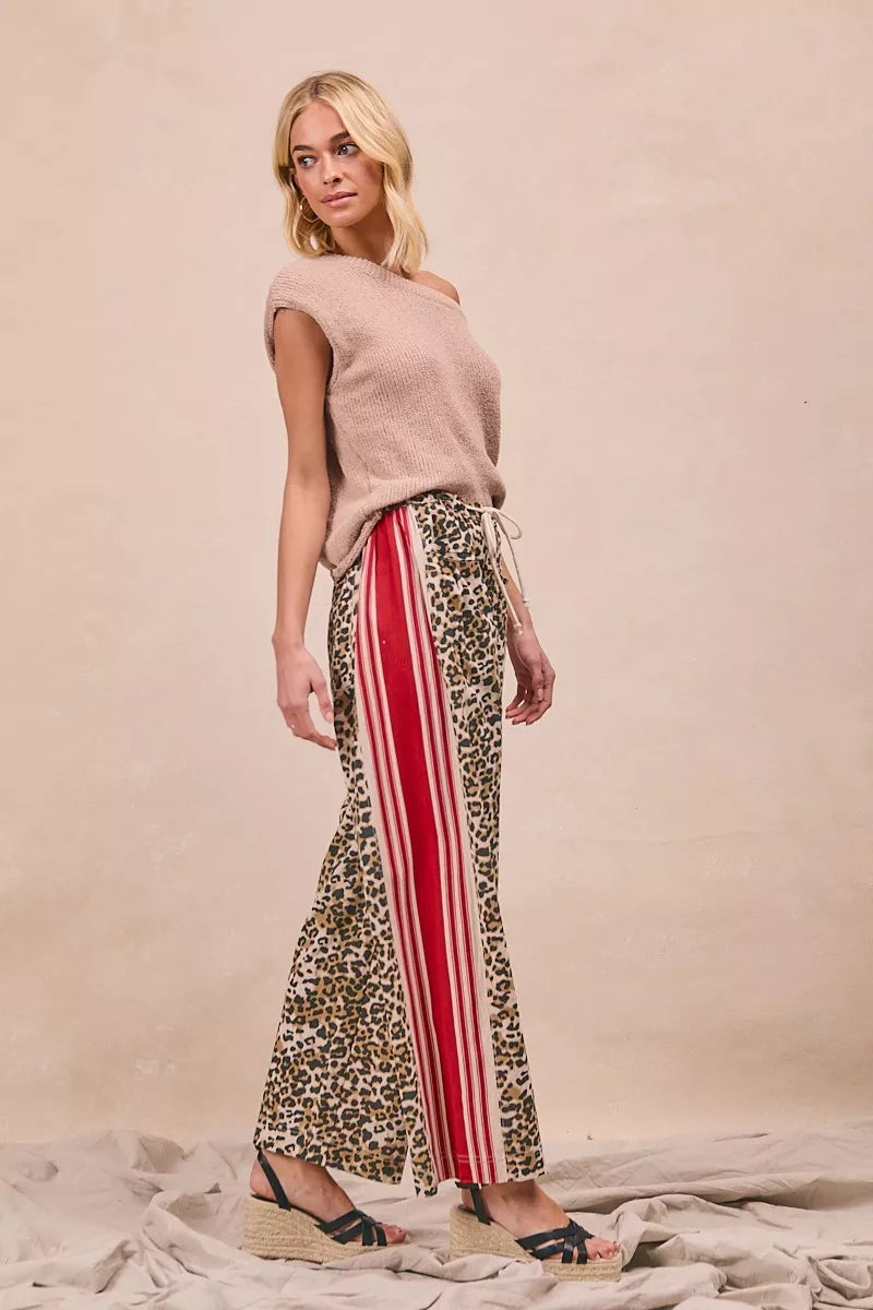BiBi Leopard Print Pants with red white side stripes and welt pockets