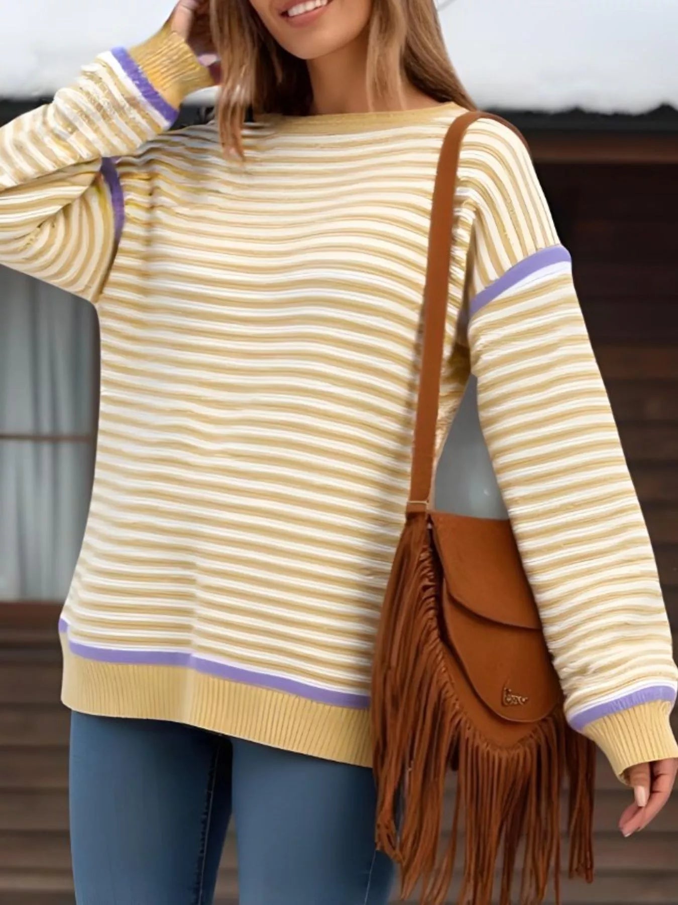 Cozy striped round neck long sleeve sweater in pale yellow, white, and purple trim