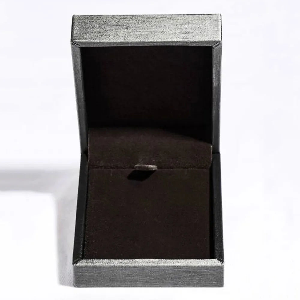 Black jewelry box with a silver lid on a white background