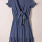 Soft blue chiffon tie-front mini dress with smocked waist and ruffled sleeves