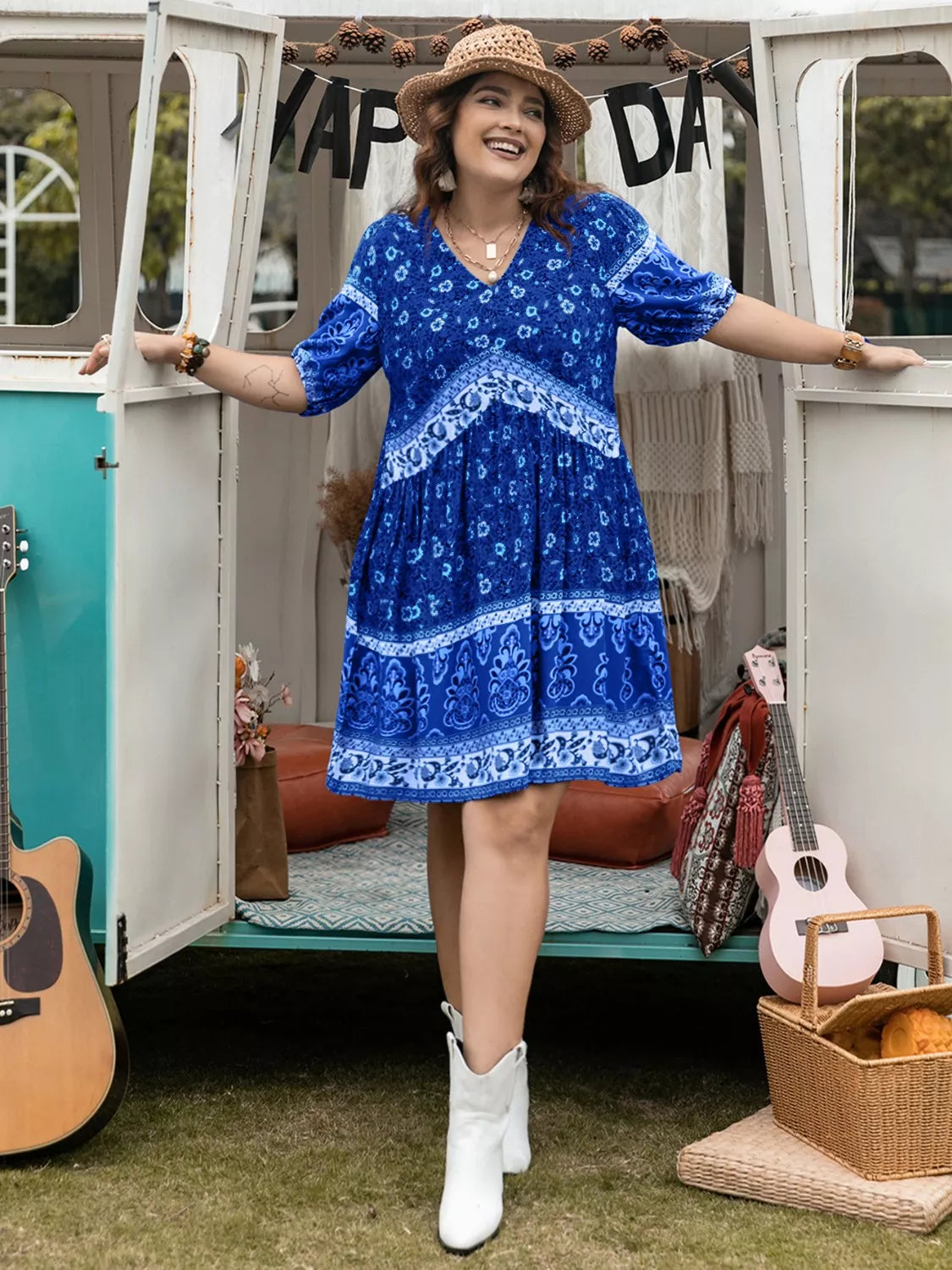 Plus size floral v-neck mini dress in vibrant blue bohemian paisley