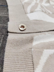 Beige textured button on zebra print cardigan sweater