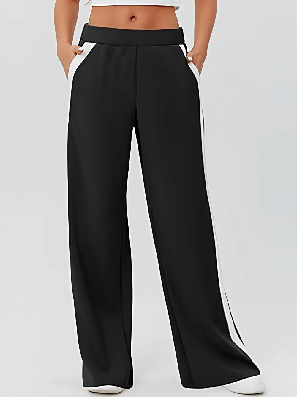 Black wide-leg pants with white side stripes and high waistband