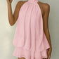 Soft pink halter neck ruched mini dress with layered skirt