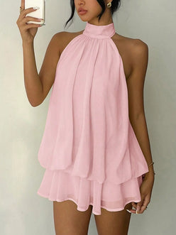 Soft pink halter neck ruched mini dress with layered skirt