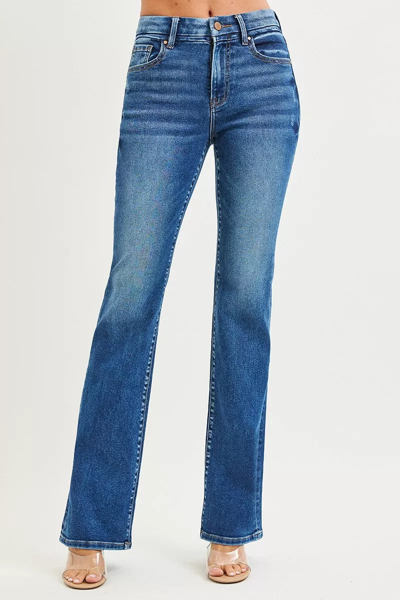 Risen high-rise bootcut jeans in blue denim with flared legs and distressed details