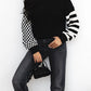 Striped and checkered turtleneck dropped shoulder knit sweater