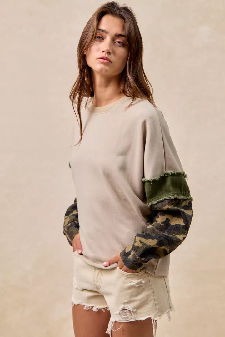 BiBi Camo Sleeve French Terry Top with Frayed Edge | Daverri Fashions