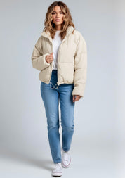 Cream zip-up puffer jacket with fur-lined hood and drawstring