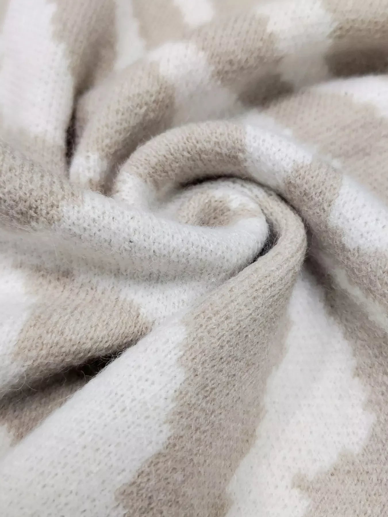 Beige and white zebra striped plush button-up cardigan