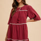 Annie Wear Tassel Contrast Trim Tie Neck Half Sleeve Tiered Dress - DAVERRI FASHIONS