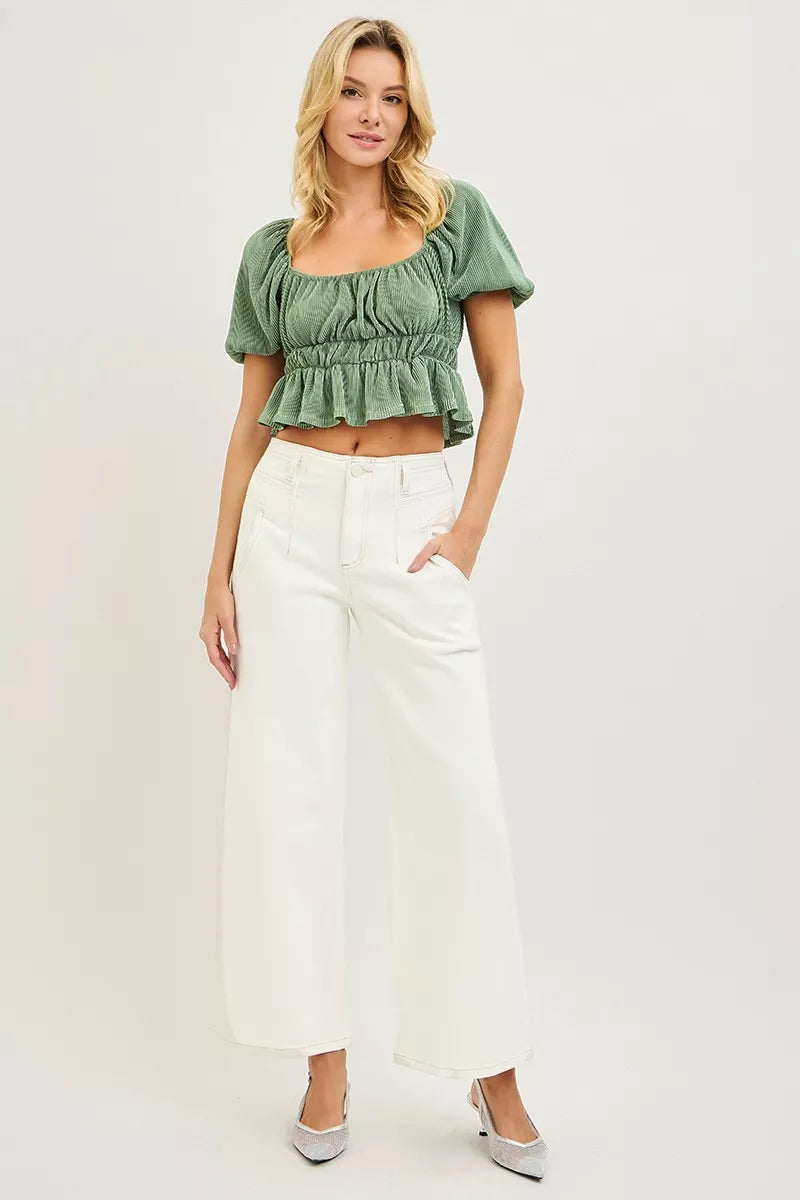 Green ruched short-sleeved crop top with square neckline, styled with RISEN High Rise Ankle Wide Pants