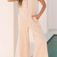 Daverri textured button front wide leg cap sleeve beige jumpsuit