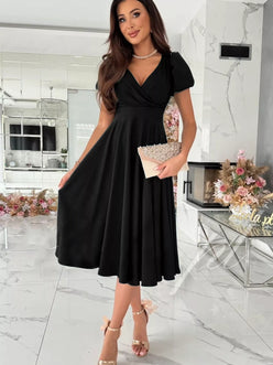 Black surplice v-neck midi dress with short puffed sleeves and flared skirt