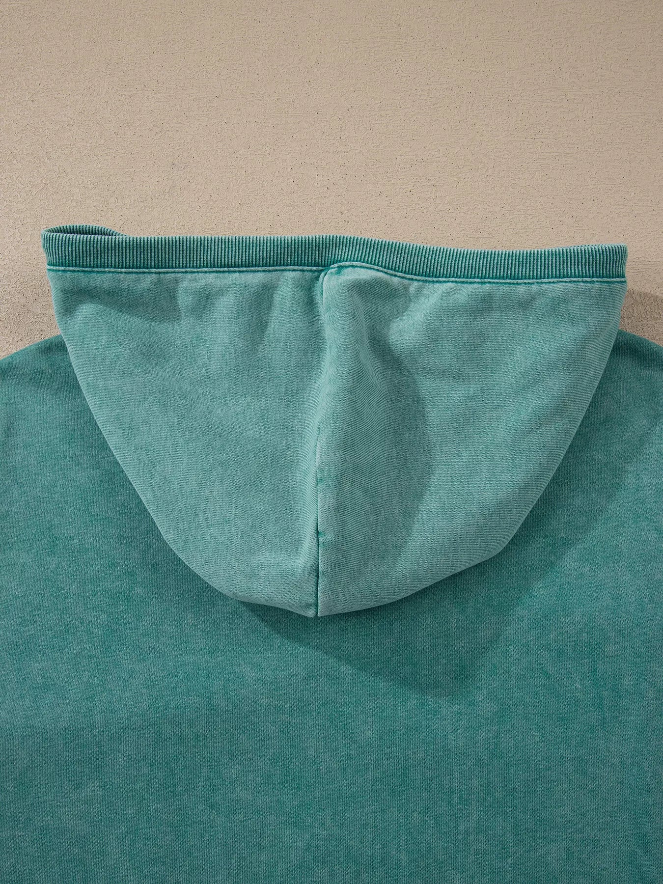 Teal mineral wash baggy hoodie for women with half zip and kangaroo pocket
