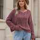 Cozy dusty rose cable-knit round neck dropped shoulder sweater