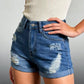 Daverri Distressed High-Waisted Denim Shorts with frayed patches and rolled cuffs