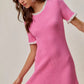 SO ME contrast ruffled sweater knit mini dress in vibrant pink with frayed trim