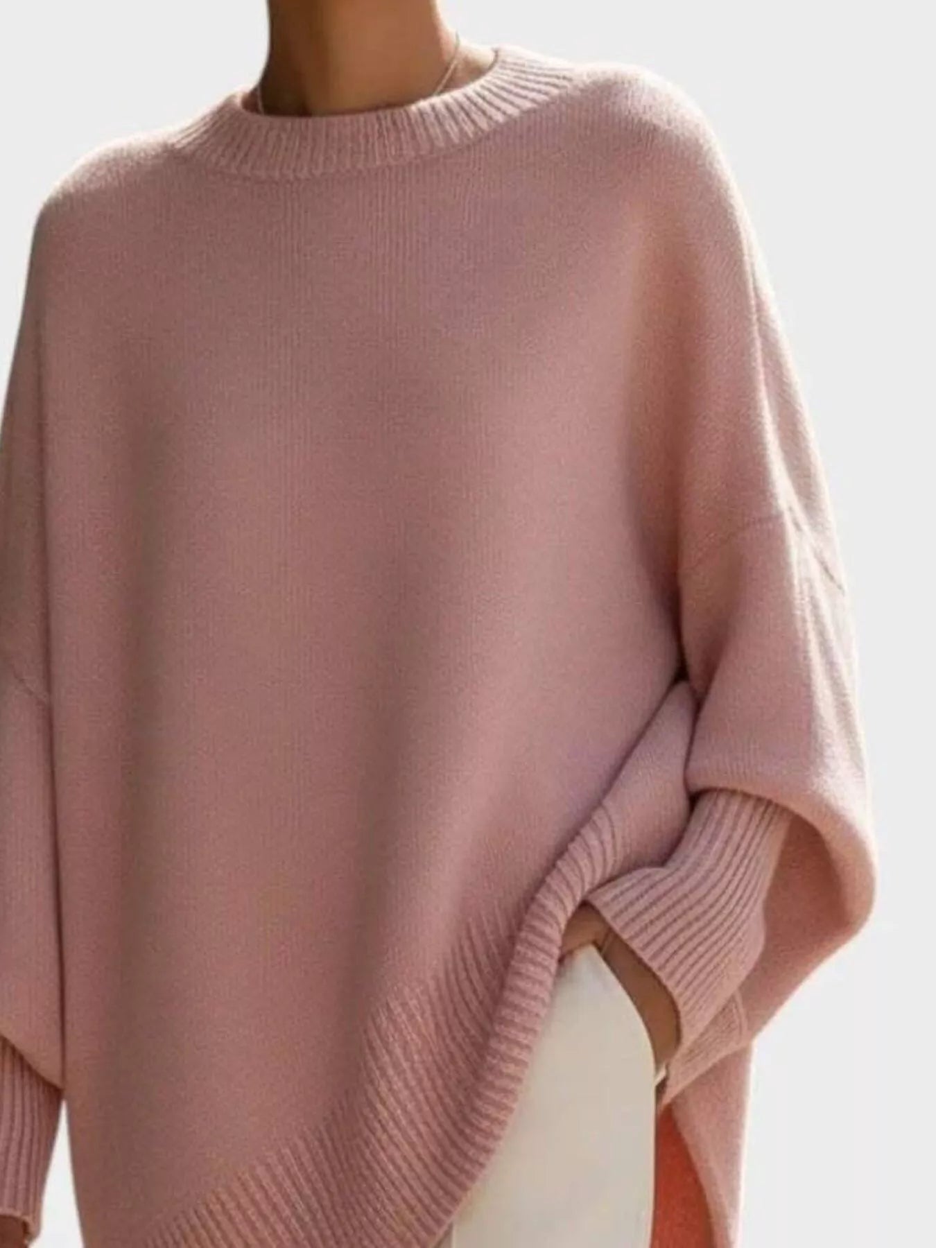 Women’s oversized blush pink batwing sleeve knit sweater