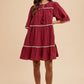 Annie Wear Tassel Contrast Trim Tie Neck Half Sleeve Tiered Dress - DAVERRI FASHIONS