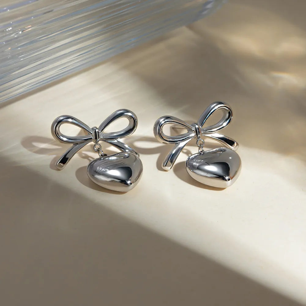 Stainless Steel Bow & Heart Drop Earrings | Earrings Daverri Fashions