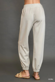 Umgee Drawstring Jogger Pants with Front Seam Detail Ecru | Joggers Daverri Fashions